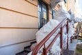 Grodno, Belarus, February 25, 2022: New arrival of clothes in a second-hand store. Old used clothes in large plastic bags.