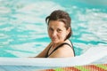 GRODNO, Belarus - Health resort Porechye. Beautiful woman bathes in the pool. Royalty Free Stock Photo