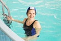 GRODNO, Belarus - Health resort Porechye. Beautiful woman bathes in the pool. Royalty Free Stock Photo