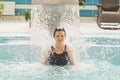 GRODNO, Belarus - Health resort Porechye. Beautiful woman bathes in the pool. Royalty Free Stock Photo