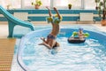 GRODNO, Belarus - Health resort Porechye. Children bathe in a shallow pool.