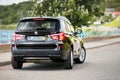 GRODNO, BELARUS - JUNE 2020: BMW X3 II F25 2.0i xDrive selective focus three fourth back view with wheels turned