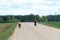 Grodno, Belarus, June 01.2019: Cycle tourism. Active rest on the nature. Travel by Bicycle. Weekend in the country. Two cyclists Royalty Free Stock Photo