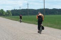 Grodno, Belarus, June 01.2019: Cycle tourism. Active rest on the nature. Travel by Bicycle. Weekend in the country. Two cyclists Royalty Free Stock Photo