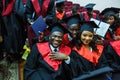 GRODNO, BELARUS - JUNE, 2018: Foreign african medical students in square academic graduation caps and black raincoats during Royalty Free Stock Photo