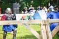 GRODNO, BELARUS - JUNE 2019: medieval jousting knight fight, in armor, helmets, chain mail with axes and swords on lists. historic