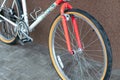 Grodno, Belarus, March 10, 2019: Old mountain bike against the brown wall. Repair of retro bicycles. Beautiful bike with unusual