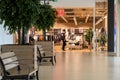 Grodno, Belarus May 20, 2021: corridor of a large shopping center. Benches and recreation areas for store visitors. Beautiful