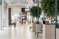 Grodno, Belarus May 20, 2021: corridor of a large shopping center. Benches and recreation areas for store visitors. Beautiful