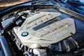 Modern luxury BMW 750Li XDrive twin turbo engine with opened hood