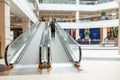 Grodno, Belarus May 20, 2021: View of the escalator in the public shopping center. Moving stairs and escalator railings of a major Royalty Free Stock Photo