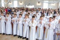 GRODNO, BELARUS - MAY 2019: Young children in the Catholic Church are waiting for the first eucharist communion. Little angels in