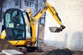 Grodno, Belarus - November, 22 2021: JCB 8018 CTS excavator digging sand and concrete at construction site. JCB mini Royalty Free Stock Photo