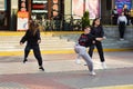 Three girls have fun incendiary dancing street dances