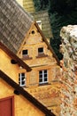 Grodno Castle in Zagorze Slaskie, Lower Silesia, Poland. Pitched shingle roofs of gatehouse building with precious sgraffito. Royalty Free Stock Photo