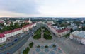 Grodno Regional Drama Theater and Holy Cross Church And Traffic In Mostowaja And Kirova Streets in the morning light