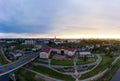 Grodno Regional Drama Theater and Holy Cross Church And Traffic In Mostowaja And Kirova Streets in the morning light