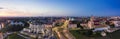 Grodno Regional Drama Theater and Holy Cross Church And Traffic In Mostowaja And Kirova Streets in the morning light. Grodno city