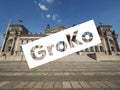 Groko (Grosse Koalition) over Reichstag parliament in Berlin