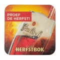 Grolsch Herfstbok beermat. Isolated on white background.