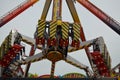 GRONINGEN, NETHERLANDS - MAY 20, 2022: People at pendulum ride attraction in outdoor amusement park