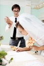 Groom applauding to bride Royalty Free Stock Photo