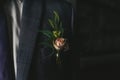 Groom in a blue suit with flower of rose in the pocket of jacket Royalty Free Stock Photo