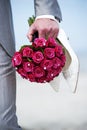 groom with bouquet