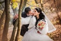 The groom and the bride in autumn park Royalty Free Stock Photo