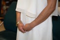 Groom and bride detail hands during wedding ceremony