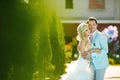 Groom and bride and grass Royalty Free Stock Photo