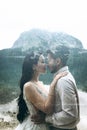 The groom and the bride hug and kiss Royalty Free Stock Photo