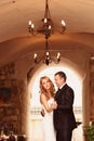 Groom and bride indoors on their wedding day Royalty Free Stock Photo