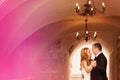 Groom and bride indoors on their wedding day Royalty Free Stock Photo