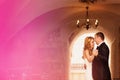 Groom and bride indoors on their wedding day Royalty Free Stock Photo