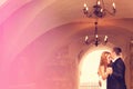 Groom and bride indoors on their wedding day Royalty Free Stock Photo