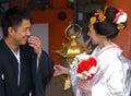Groom and bride at Kasuga Taisha shrine, Nara, Japan Royalty Free Stock Photo