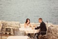 Groom and bride near the sea Royalty Free Stock Photo