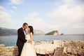 Groom and bride near the sea Royalty Free Stock Photo