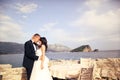 Groom and bride near the sea Royalty Free Stock Photo