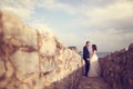 Groom and bride near the sea Royalty Free Stock Photo