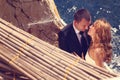 Groom and bride near the sea Royalty Free Stock Photo