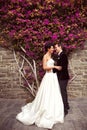 Groom and bride outdoors on their wedding day Royalty Free Stock Photo
