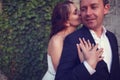 Groom and bride outdoors on their wedding day Royalty Free Stock Photo