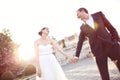 Groom and bride outdoors on their wedding day Royalty Free Stock Photo