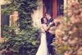 Groom and bride outdoors on their wedding day Royalty Free Stock Photo