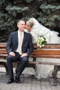 Groom and the bride in park on a bench Royalty Free Stock Photo