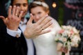 Groom and bride showing wedding rings on their fingers Royalty Free Stock Photo