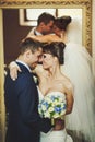 Groom and bride is smiling on the background miror Royalty Free Stock Photo