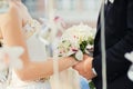 Groom and bride during wedding ceremony, close up on hands. Wedding couple and outdoor wedding ceremony Royalty Free Stock Photo